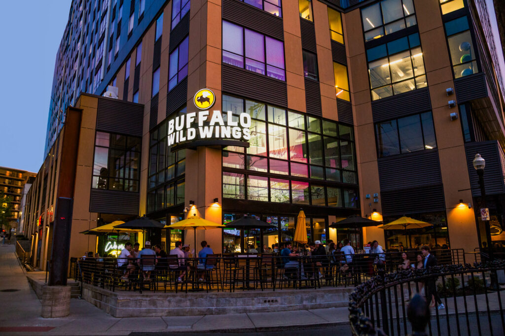 Exterior view of Buffalo Wild Wings at 134 S. Garner St., State College, featuring modern façade and signage.